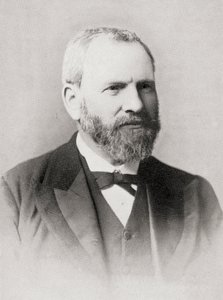 Alfred Thomas, de 